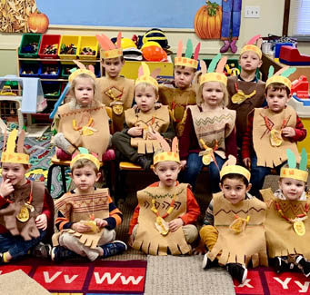 children dressed for Thanksgiving