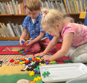 Students playing with blocks