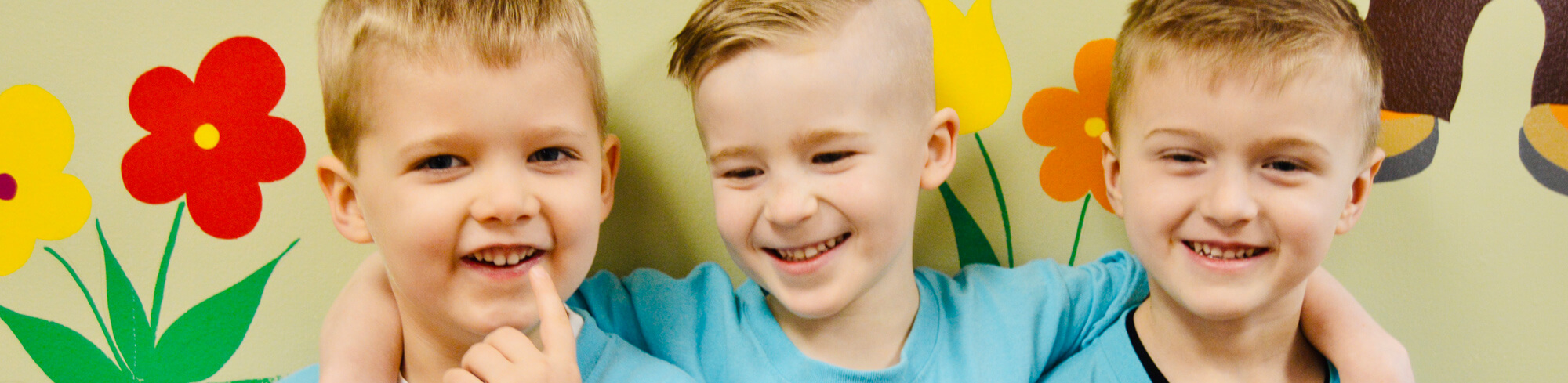 Three smiling children